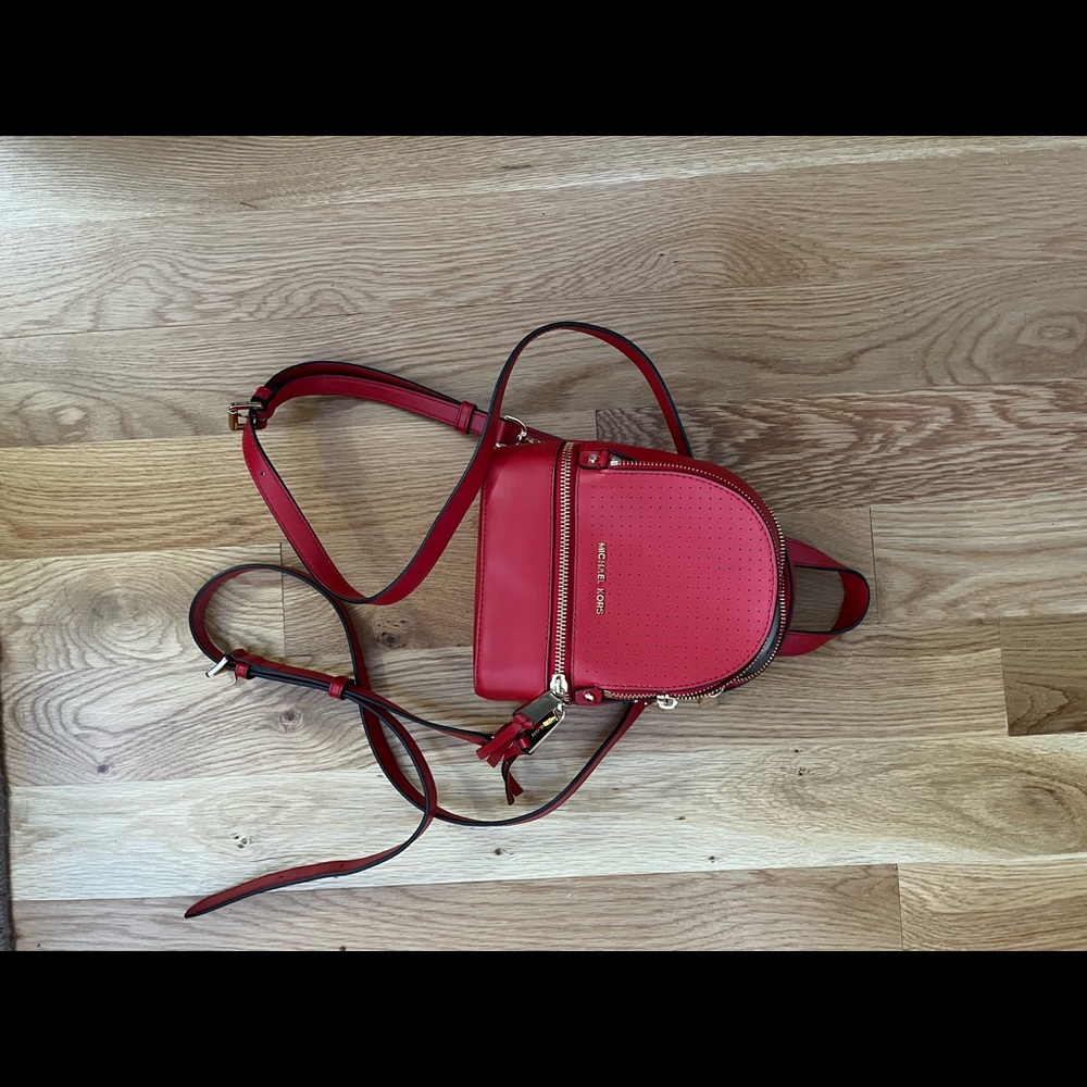 Barely used Michael Kors mini backpack. Excellent condition.